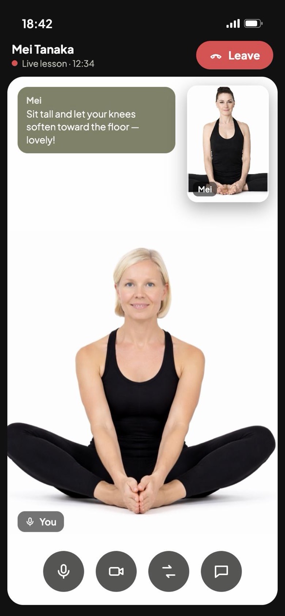 A live yoga lesson inside the app: you and your instructor on video, in the same pose